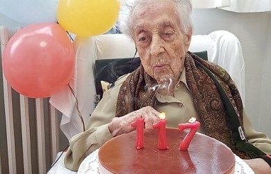 Old woman and a birthday cake