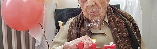 Old woman and a birthday cake